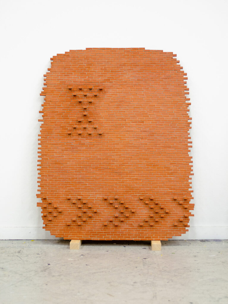 CODE 4 by swiss artist Jonathan Steiger, a relief made from miniature bricks and mortar from 2021.